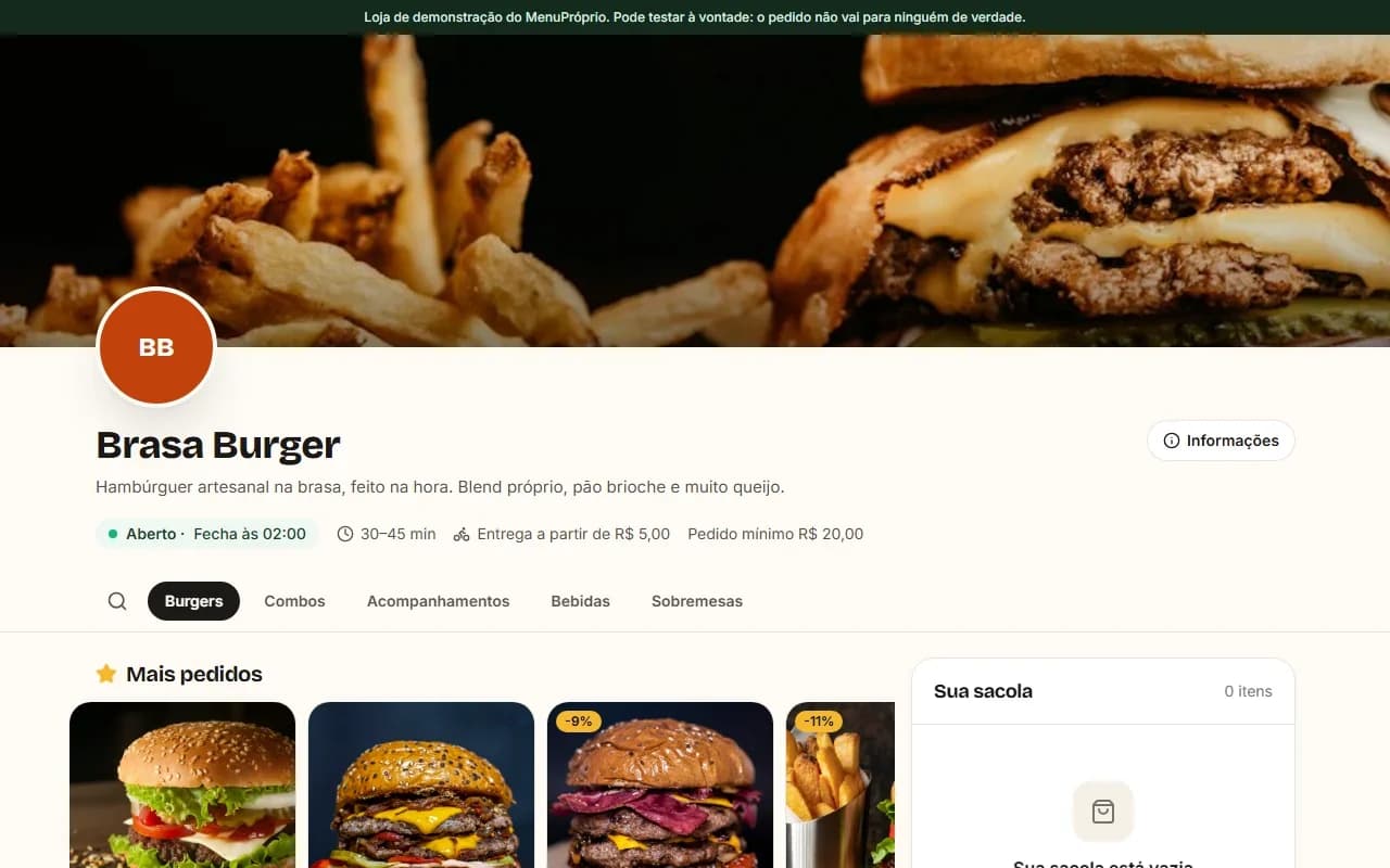 Real MenuPróprio screen: the public menu of a demo burger restaurant on a computer, with best sellers highlighted and the bag alongside.