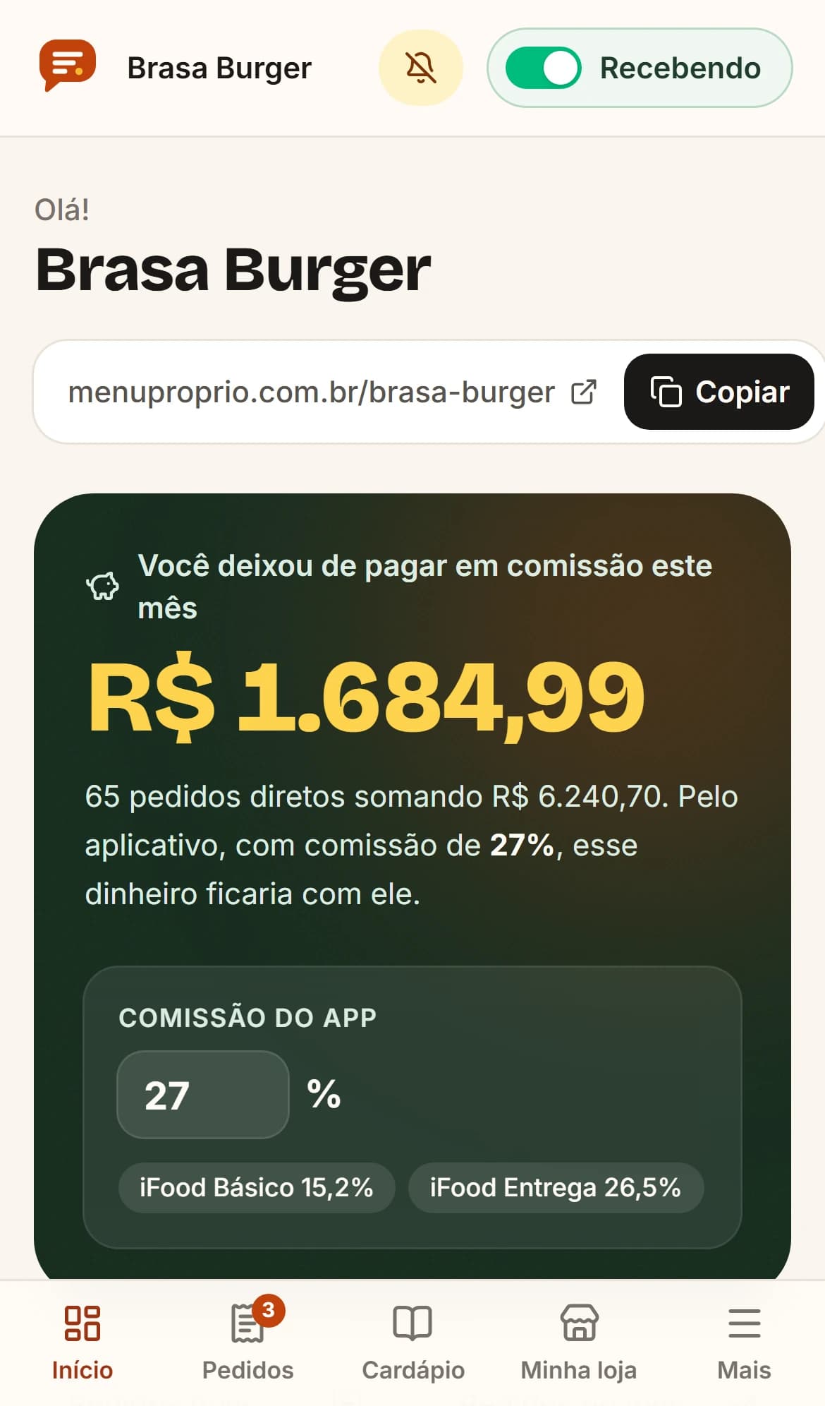 Real MenuPróprio dashboard screen on a phone: the menu link to copy and how much the restaurant saved in commission this month compared with a delivery app.